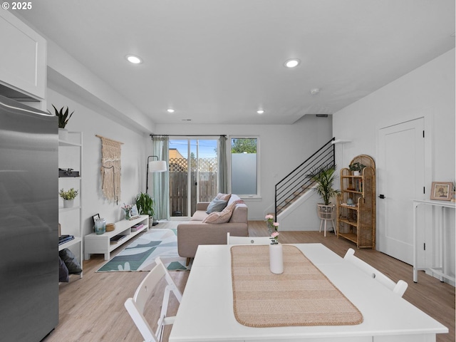 dining space featuring light hardwood / wood-style flooring