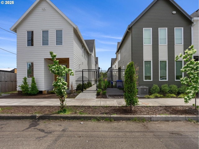 view of front property featuring central air condition unit