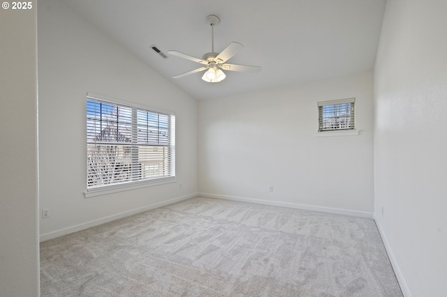 unfurnished room with lofted ceiling, light colored carpet, and ceiling fan