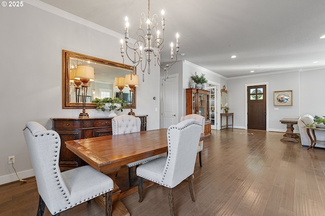 12339 SW Waterford Loop, Wilsonville, OR 97070 - dining area featuring a chandelier, crown molding, dark wood finished floors, baseboards, and recessed lighting