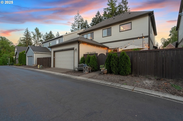 12339 SW Waterford Loop, Wilsonville, OR 97070 - traditional home featuring an attached garage