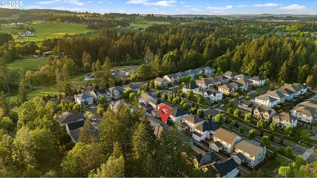 12339 SW Waterford Loop, Wilsonville, OR 97070 - aerial overview of property's location featuring a heavily wooded area and nearby suburban area