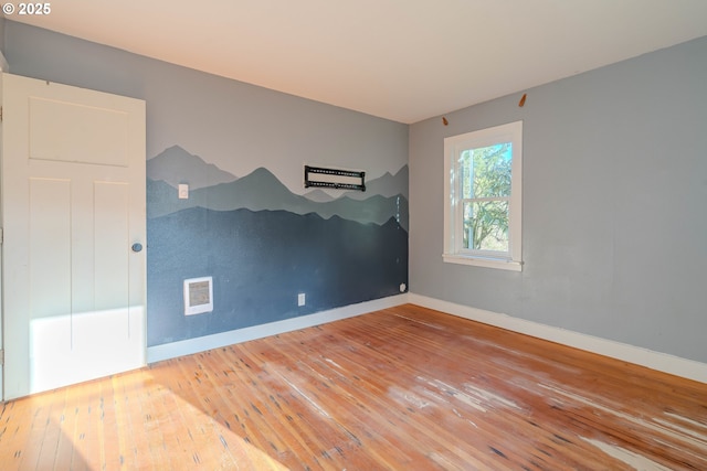 unfurnished bedroom featuring hardwood / wood-style floors