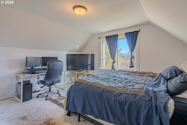 bedroom featuring lofted ceiling