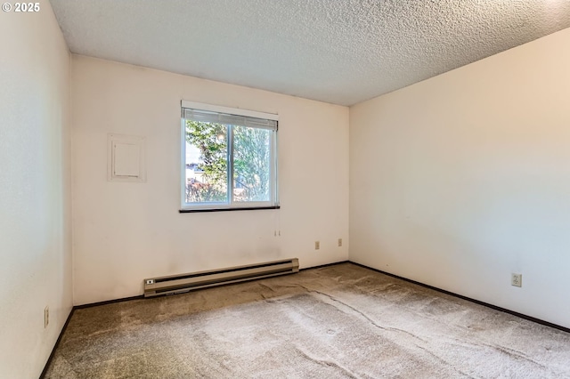 12632 NW Barnes Rd Unit 7, Portland, OR 97229 - unfurnished room featuring baseboard heating, carpet flooring, and a textured ceiling