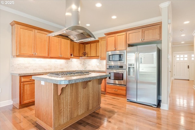 2107 NW Village Cir, Portland, OR 97229 - kitchen with stainless steel appliances, island exhaust hood, crown molding, light wood-style flooring, and backsplash