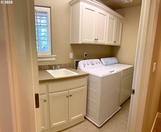 2107 NW Village Cir, Portland, OR 97229 - washroom featuring cabinet space and washer and dryer