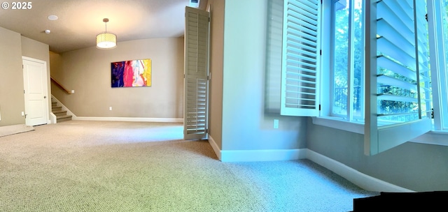 2107 NW Village Cir, Portland, OR 97229 - carpeted empty room with stairs and baseboards