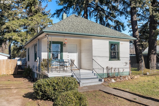 bungalow with a front lawn