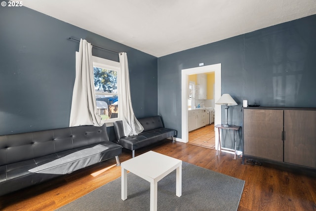 living room with dark hardwood / wood-style floors