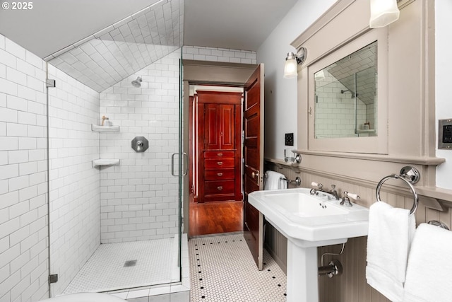 2517 NE 21st Ave, Portland, OR 97212 - bathroom featuring a shower stall and a wainscoted wall