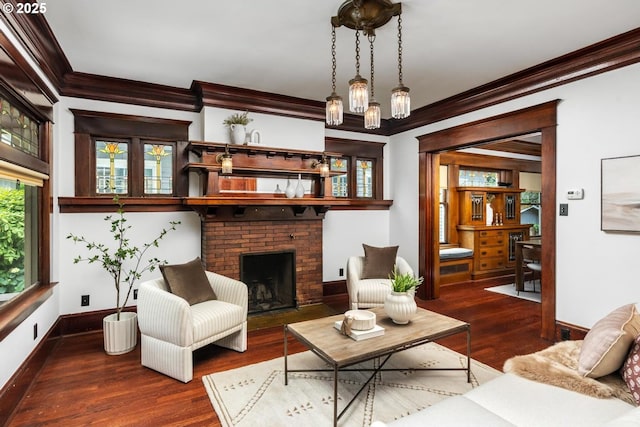 2517 NE 21st Ave, Portland, OR 97212 - living area featuring crown molding, wood finished floors, and a brick fireplace