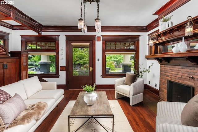 2517 NE 21st Ave, Portland, OR 97212 - living area featuring ornamental molding, dark wood-style floors, and a brick fireplace