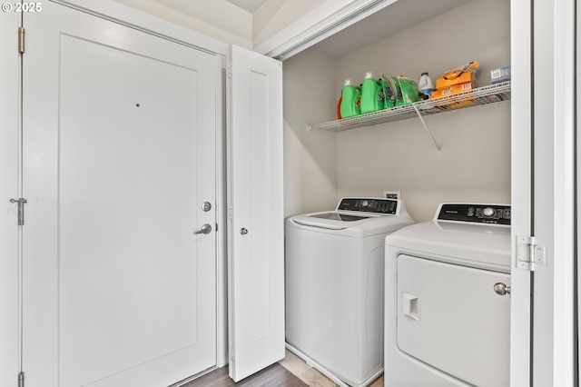 17182 SW Appledale Rd Unit 302, Beaverton, OR 97007 - laundry room featuring separate washer and dryer and wood finished floors