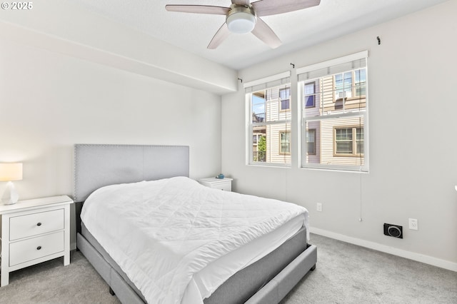 17182 SW Appledale Rd Unit 302, Beaverton, OR 97007 - carpeted bedroom featuring baseboards and ceiling fan