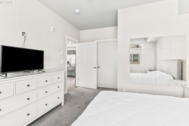 17182 SW Appledale Rd Unit 302, Beaverton, OR 97007 - bedroom with stainless steel refrigerator with ice dispenser and carpet