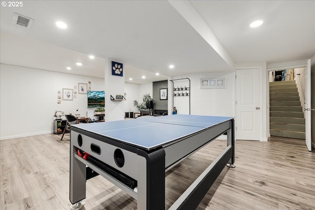 game room featuring light hardwood / wood-style floors