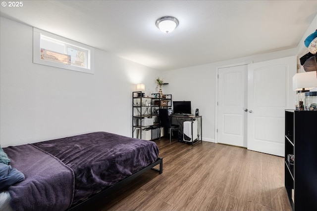 bedroom featuring hardwood / wood-style flooring