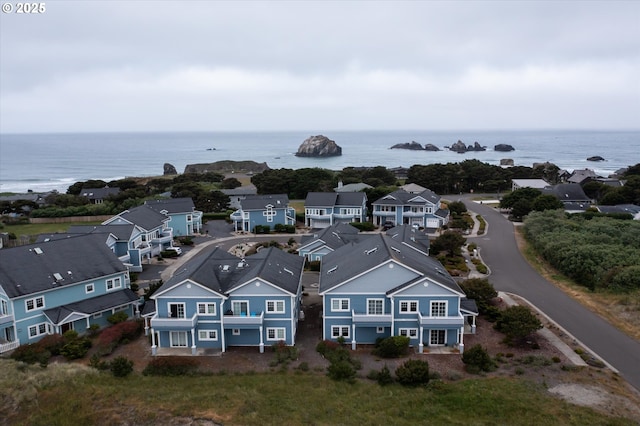1323 Village Loop, Bandon, OR 97411 - aerial view of residential area featuring a large body of water