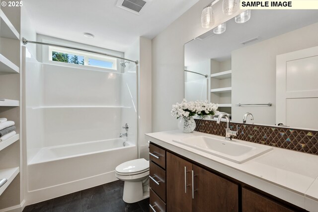 full bathroom featuring tasteful backsplash, toilet, visible vents, washtub / shower combination, and vanity