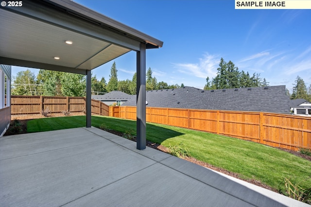 view of patio with a fenced backyard