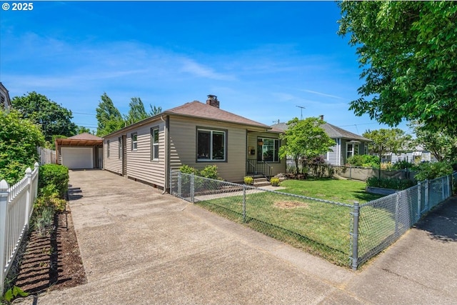 2185 Laurel Ave, Salem, OR 97301 - view of front of property with an outbuilding, a garage, a chimney, and driveway