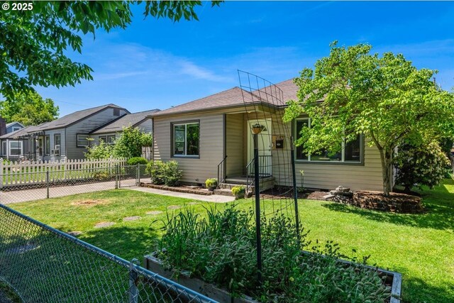 2185 Laurel Ave, Salem, OR 97301 - view of front of property featuring a vegetable garden