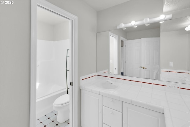 19915 SW Celebrity St, Beaverton, OR 97078 - full bathroom featuring toilet, vanity, tile patterned floors, and shower / tub combination