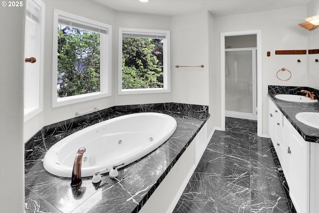 19915 SW Celebrity St, Beaverton, OR 97078 - full bathroom with a shower stall, a tub with jets, a sink, marble finish floor, and double vanity