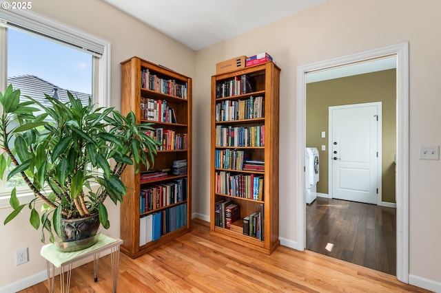 2053 Lakeview Dr, Eugene, OR 97408 - sitting room with independent washer and dryer and wood finished floors