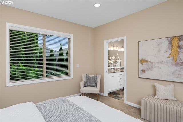 2053 Lakeview Dr, Eugene, OR 97408 - bedroom with light colored carpet, recessed lighting, and connected bathroom