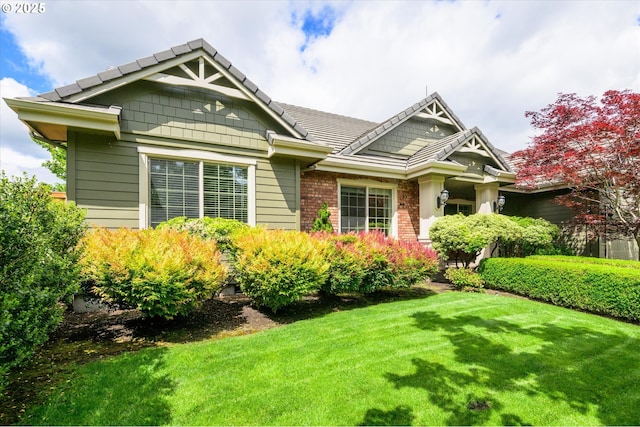 2053 Lakeview Dr, Eugene, OR 97408 - craftsman-style home with a front lawn, brick siding, and a tile roof