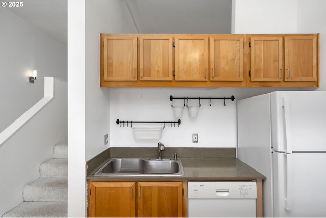 1910 SW 18th Ave Unit 34, Portland, OR 97201 - kitchen with white appliances and dark countertops