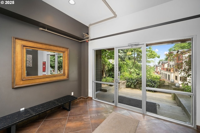 1910 SW 18th Ave Unit 34, Portland, OR 97201 - doorway to outside with healthy amount of natural light and tile patterned floors