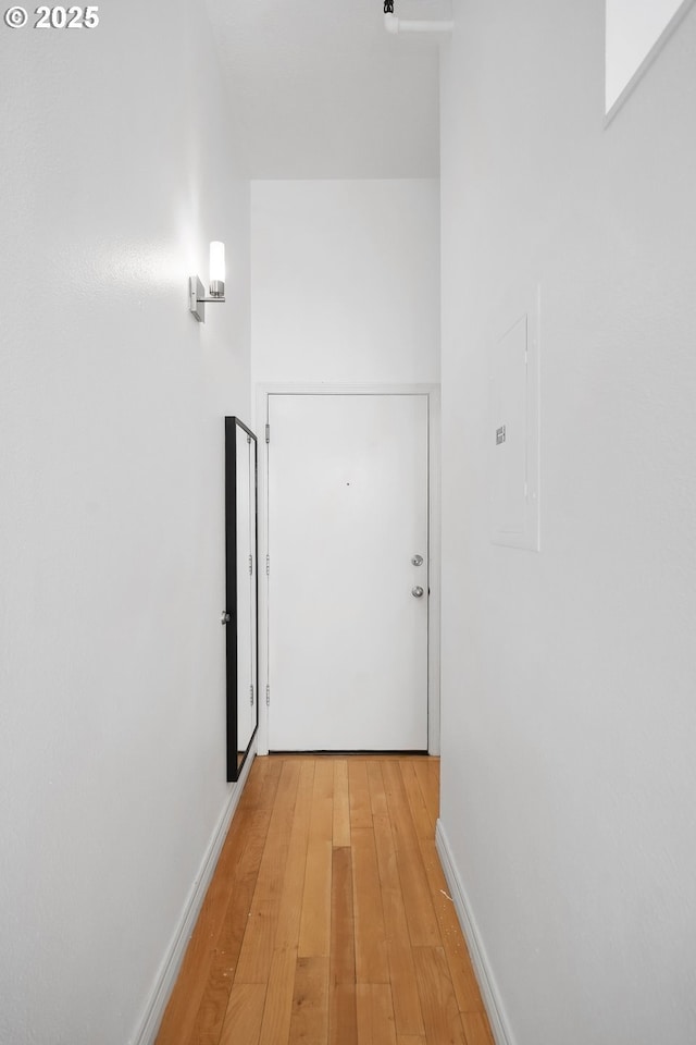 1910 SW 18th Ave Unit 34, Portland, OR 97201 - hall featuring electric panel and light wood-type flooring