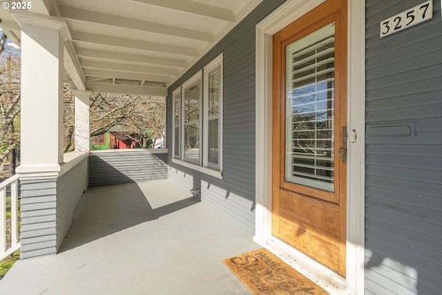 entrance to property with a porch