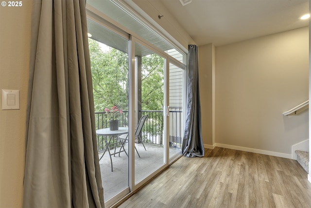 475 NE Liberty Ave, Gresham, OR 97030 - doorway to outside featuring light wood finished floors and baseboards