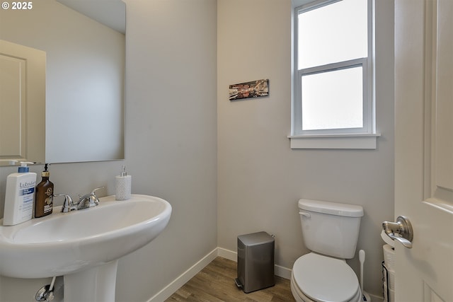 475 NE Liberty Ave, Gresham, OR 97030 - half bathroom featuring toilet and wood finished floors