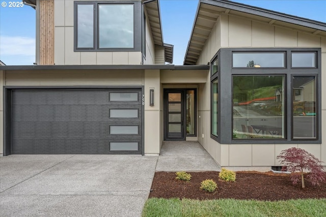 750 N V St, Washougal, WA 98671 - view of front of property featuring concrete driveway and a garage
