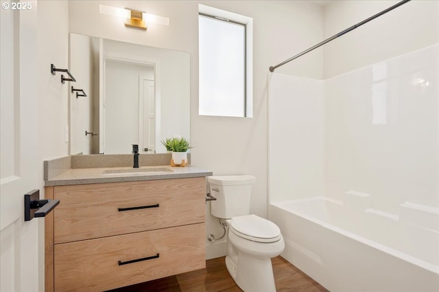 750 N V St, Washougal, WA 98671 - full bath featuring toilet, wood finished floors, vanity, and  shower combination