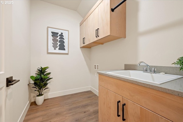 750 N V St, Washougal, WA 98671 - laundry area featuring light wood-style floors, washer hookup, baseboards, and cabinet space