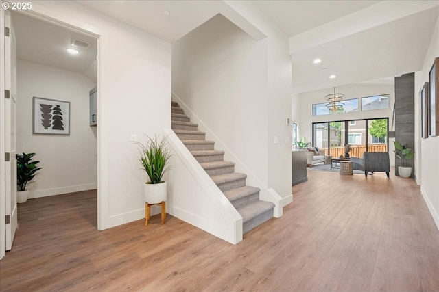 750 N V St, Washougal, WA 98671 - staircase with wood finished floors, baseboards, and recessed lighting
