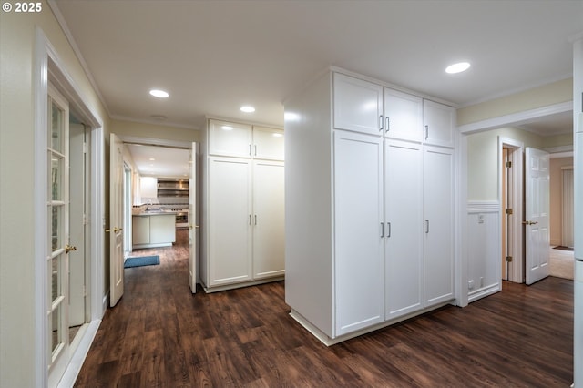 88771 Tokyo Ln, Bandon, OR 97411 - hall featuring dark wood finished floors, ornamental molding, and recessed lighting