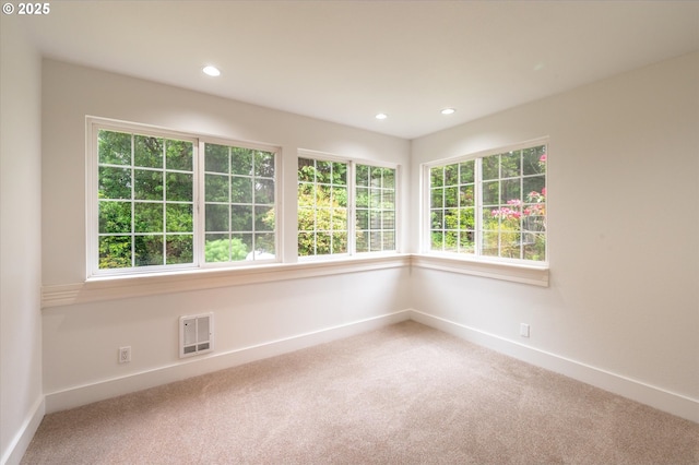 88771 Tokyo Ln, Bandon, OR 97411 - spare room featuring carpet floors, plenty of natural light, and recessed lighting