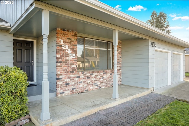 entrance to property featuring a garage