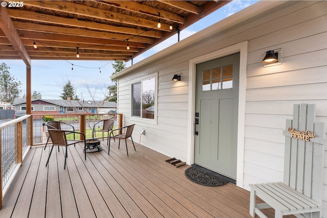 deck with a fire pit