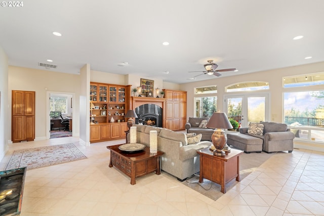 6904 SW Joshua Ct, Powell Butte, OR 97753 - living room featuring healthy amount of natural light, recessed lighting, light tile patterned floors, and ceiling fan