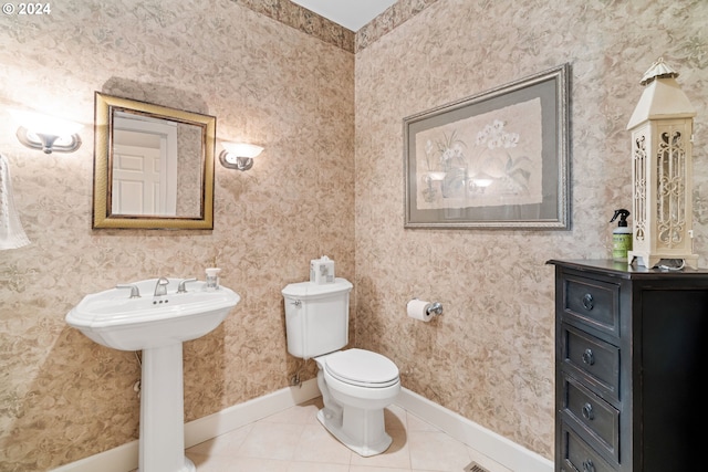 6904 SW Joshua Ct, Powell Butte, OR 97753 - half bathroom with baseboards and tile patterned floors