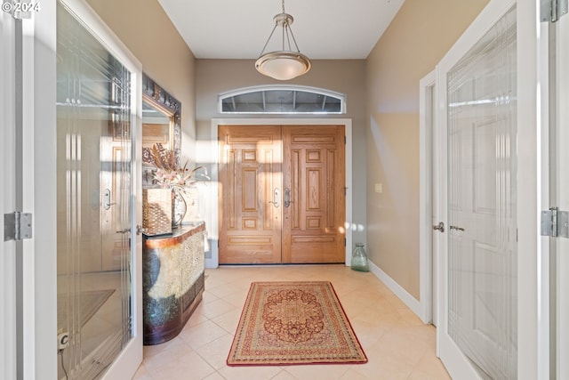 6904 SW Joshua Ct, Powell Butte, OR 97753 - entryway featuring light tile patterned floors and baseboards
