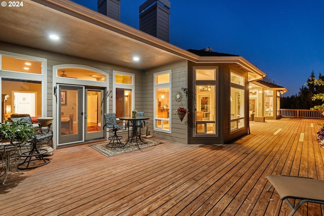 6904 SW Joshua Ct, Powell Butte, OR 97753 - deck at twilight with outdoor dining area